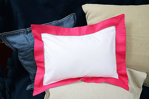 Baby pillow sham.White with Raspberry Sorbet border.12x16"pillow